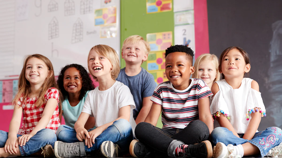 children sitting in a classroom