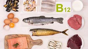 Photo of fish, eggs, and other foods rich in vitamin B12.