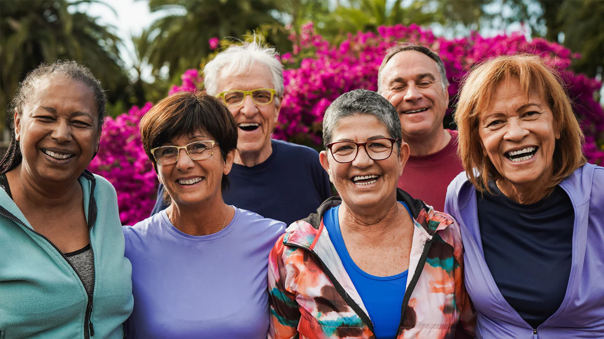 group of older adult friends smiling