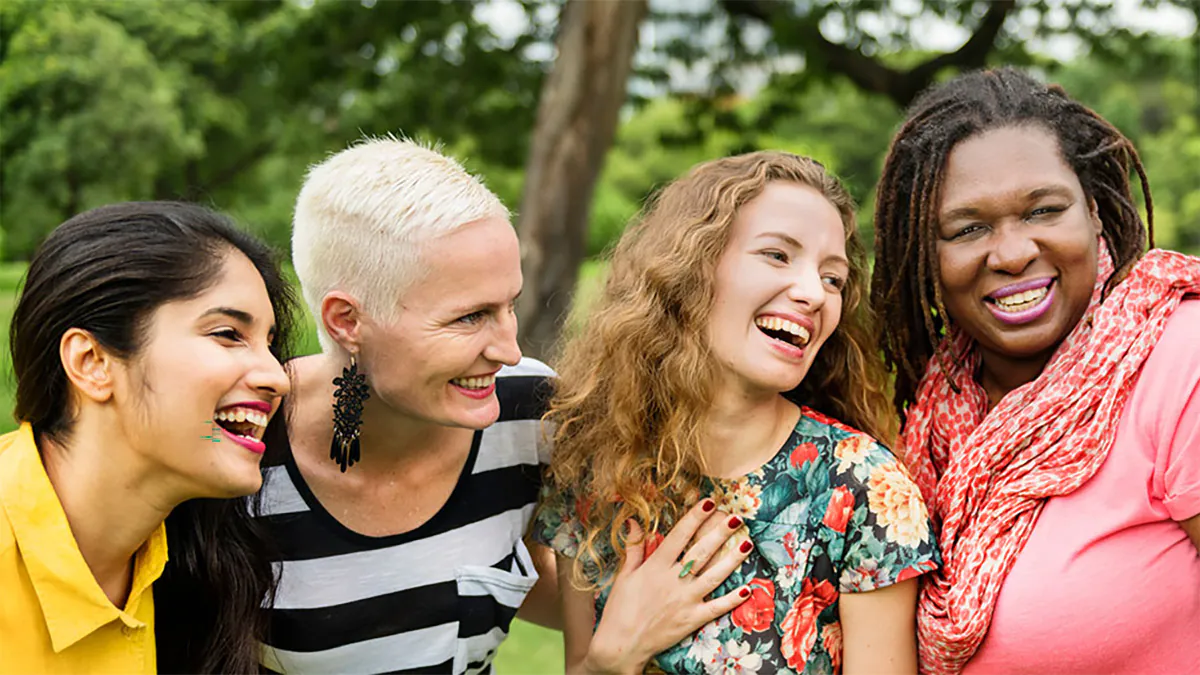 A diverse group of four women