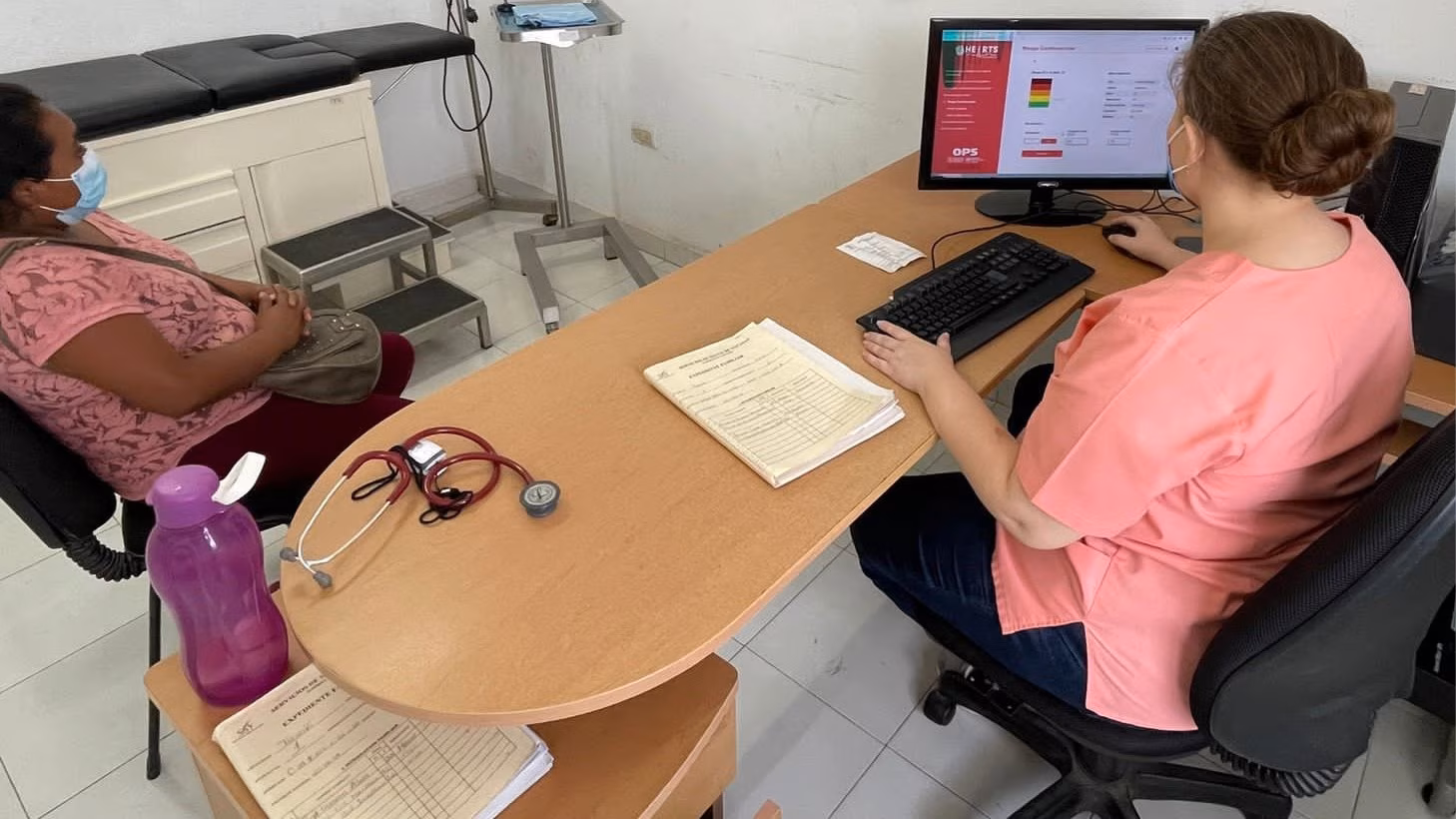 theres-an-app-for-that-1 Dr. Lizbeth Briceño using the new Risk Calculator App to counsel a patient
