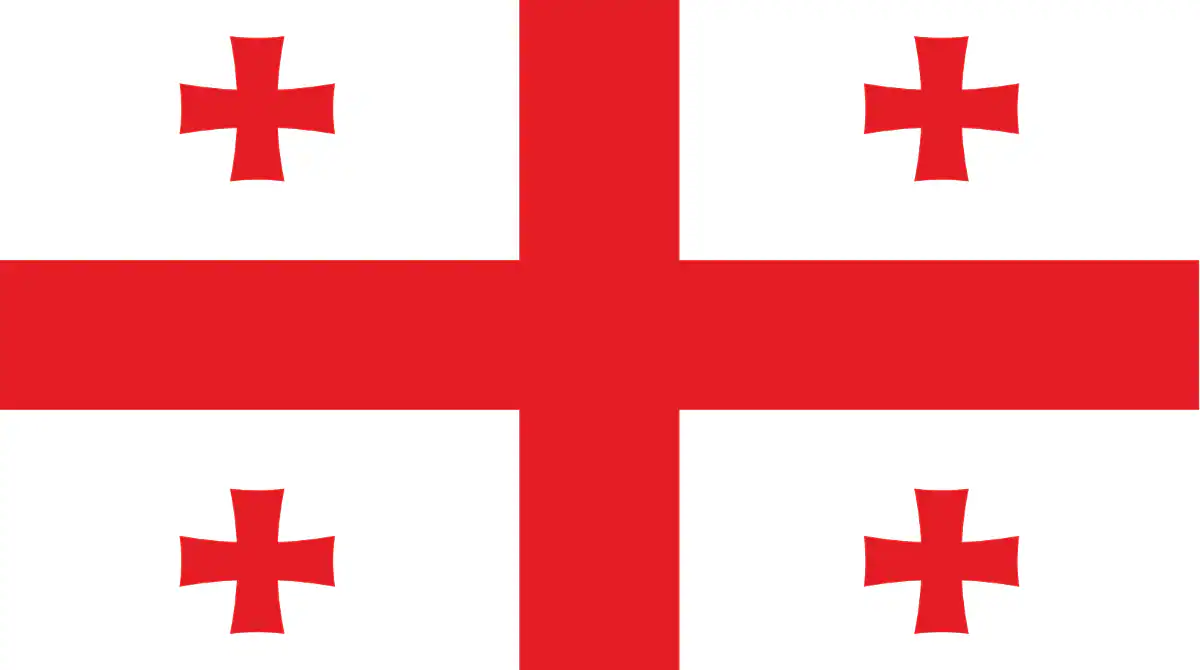 White background with a large red cross that extends to the edges of the flag.