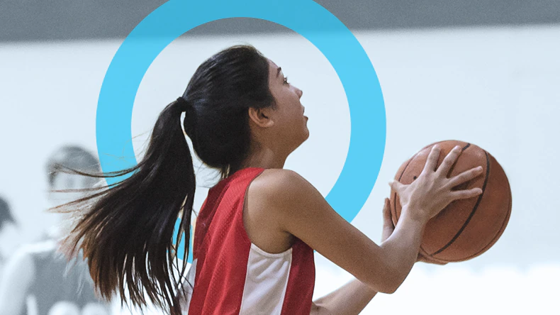 girl playing basketball