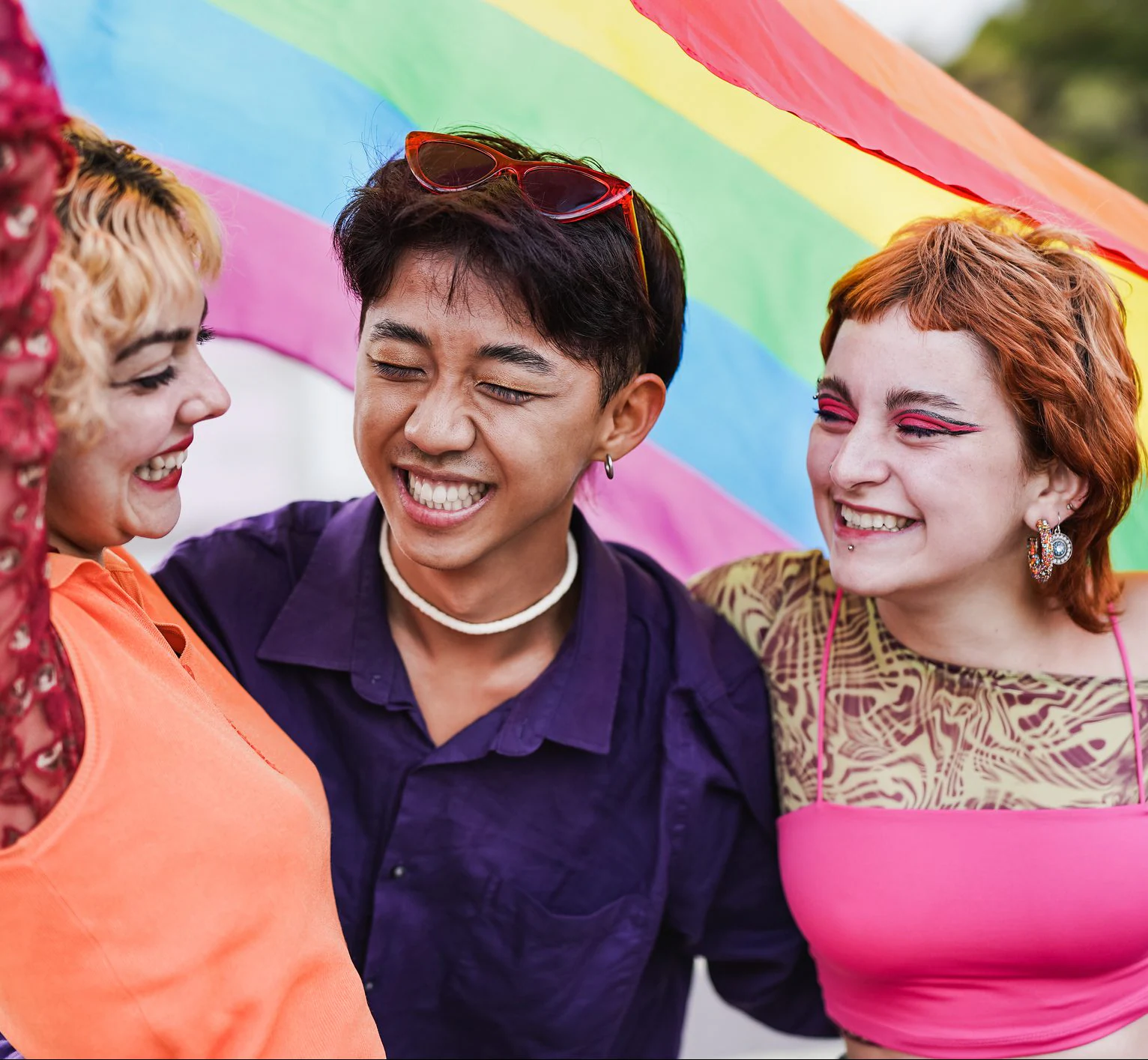 Young diverse people having fun at LGBT pride parade