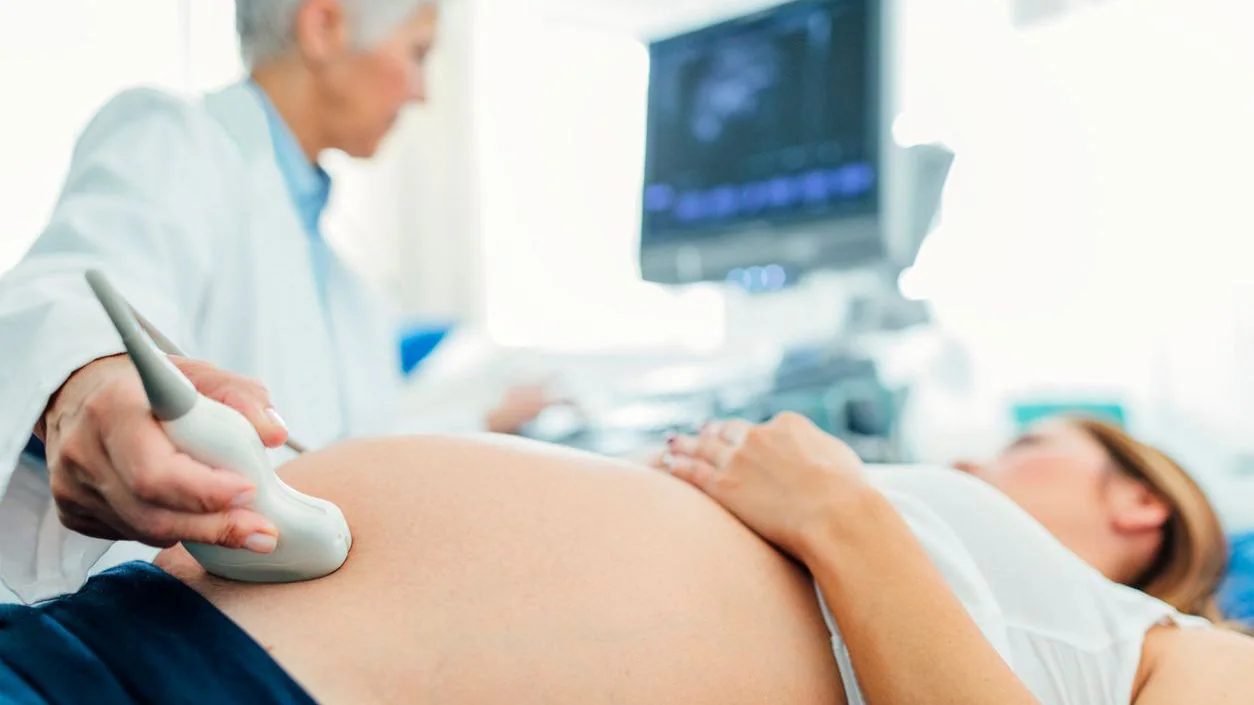 A pregnant woman getting an ultrasound