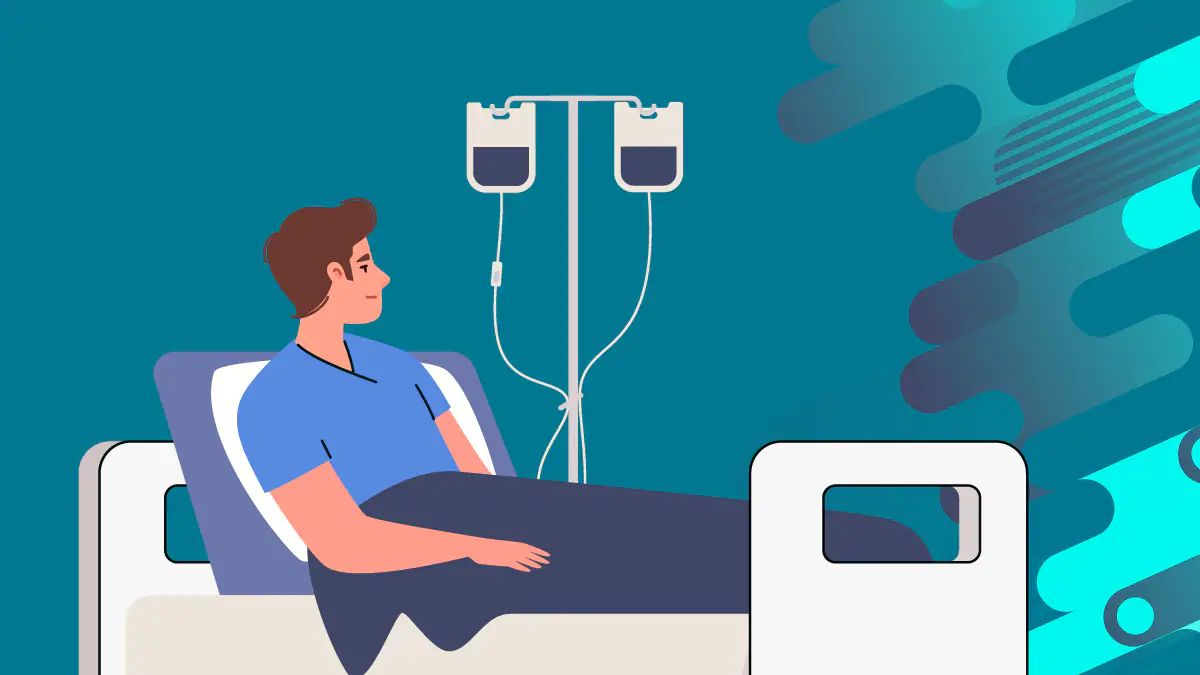 patient in hospital bed with IVs