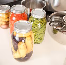 cdcwor02 Canned goods near pans on stove