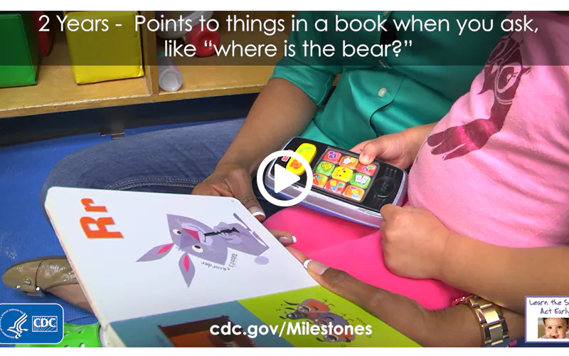 Points to things in a book when you ask, like “Where is the bear?”