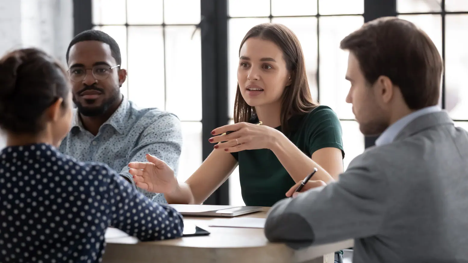 Image of people talking during meeting