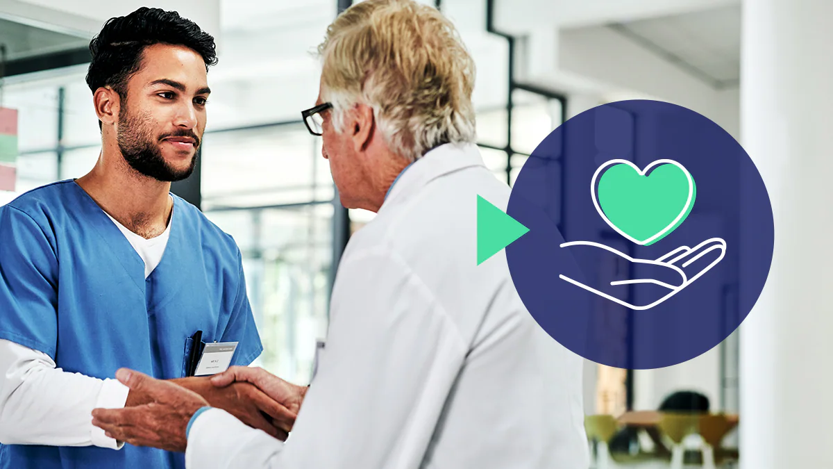 Doctor and nurse shake hands, with icon of open hand holding a heart.