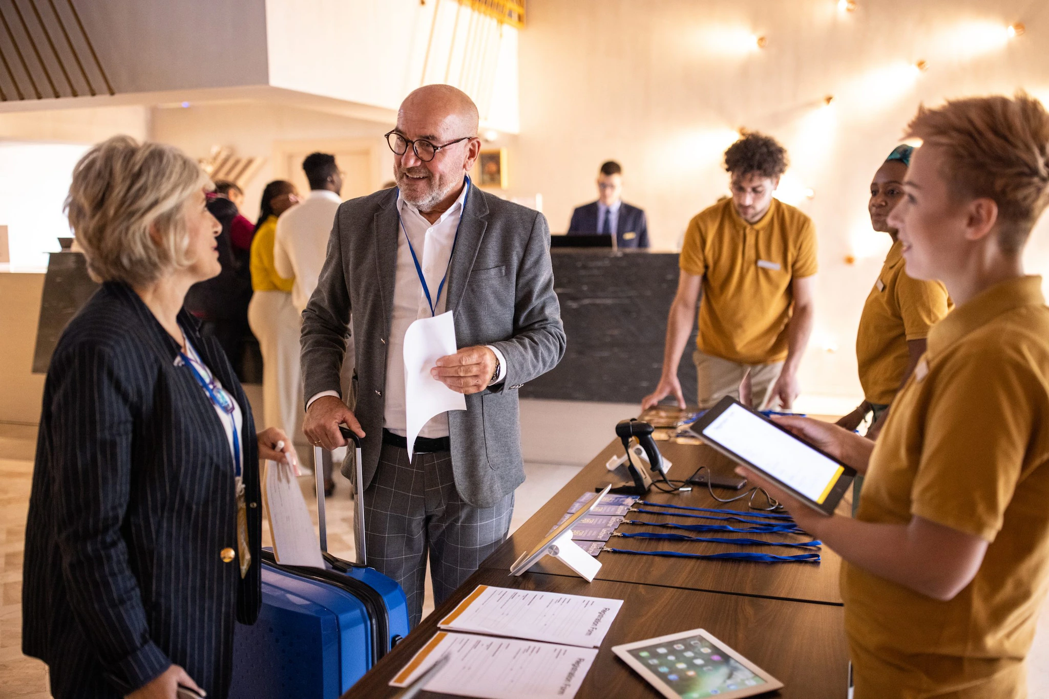 two professionals checking in for a conference