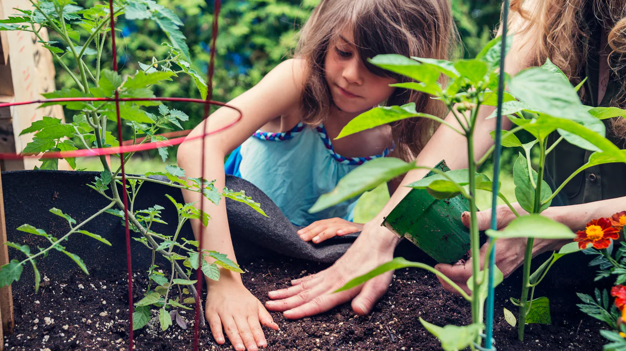 mother and daughter planting