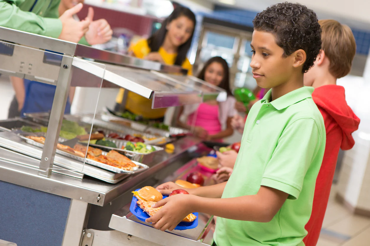 Student in line of a school cafeteria.