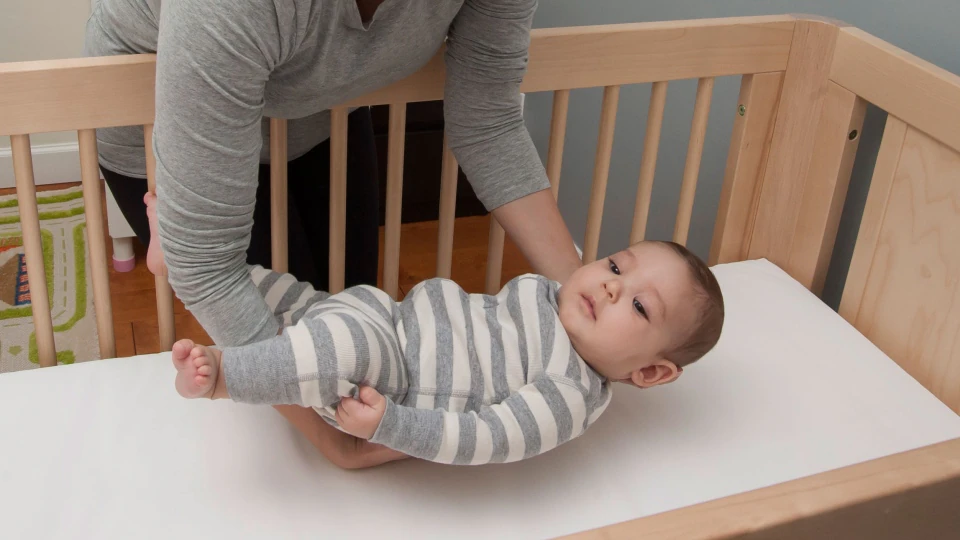 Baby placed in crib on back