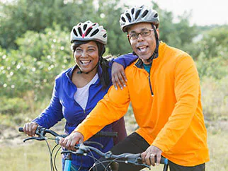 African American couple on bikes