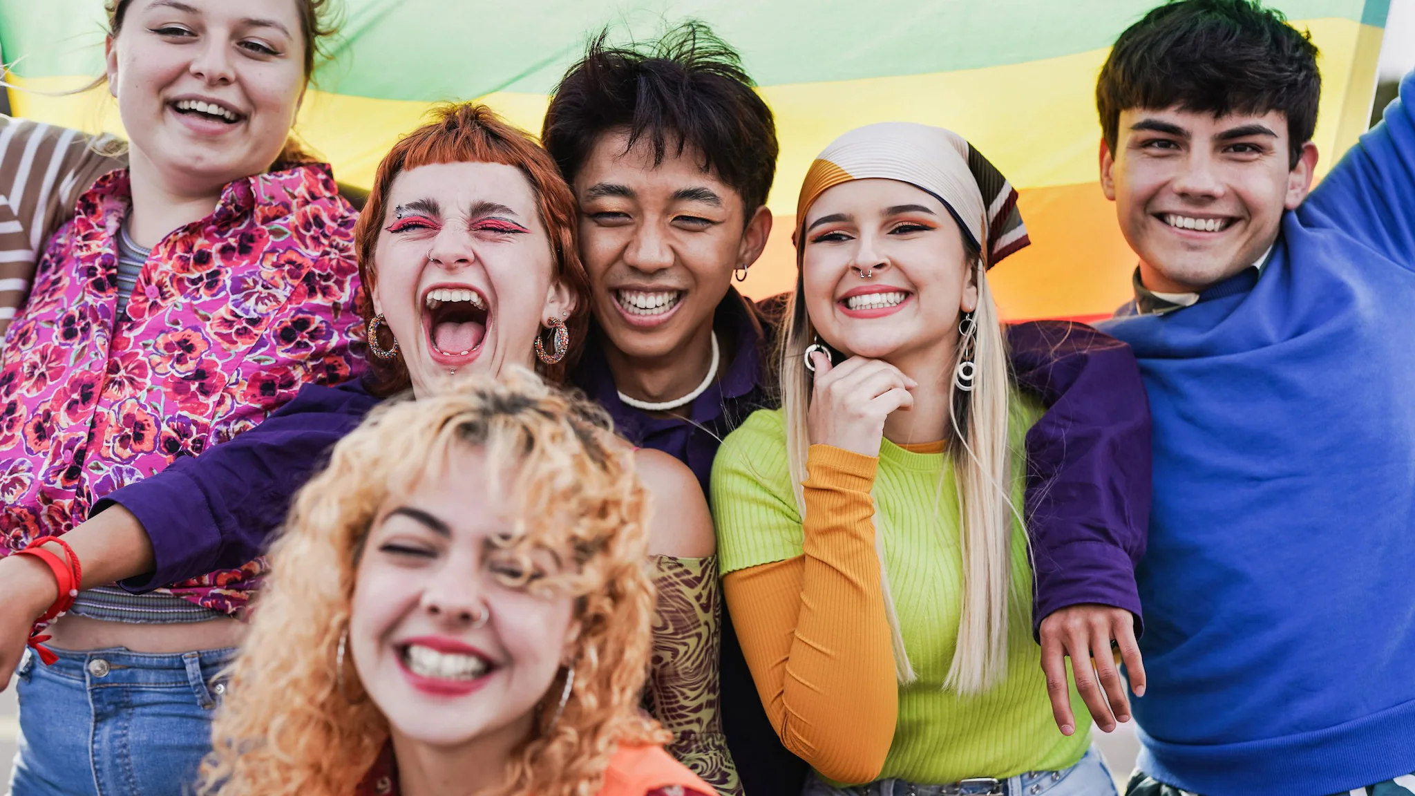 A group of students smiling and laughing.